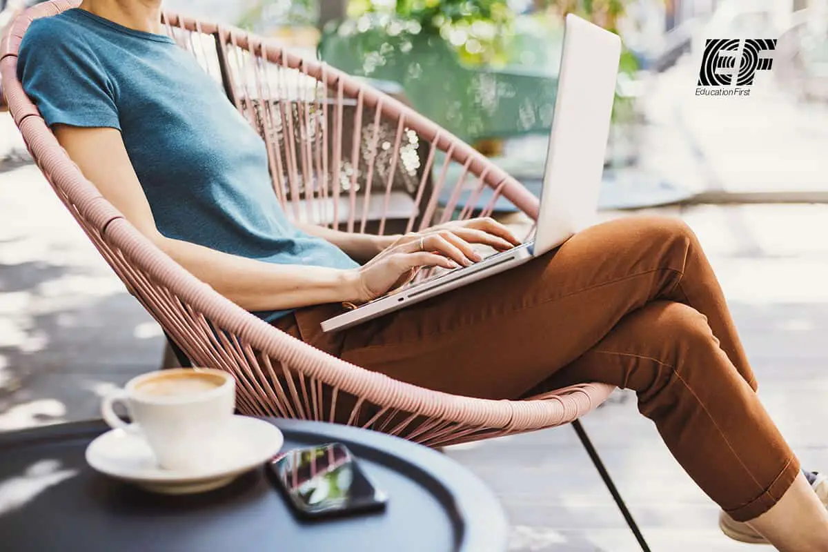 woman working with laptop teaching English online